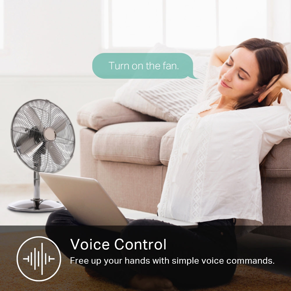 a person sitting down near a fan and issuing a voice command, turn on the fan.