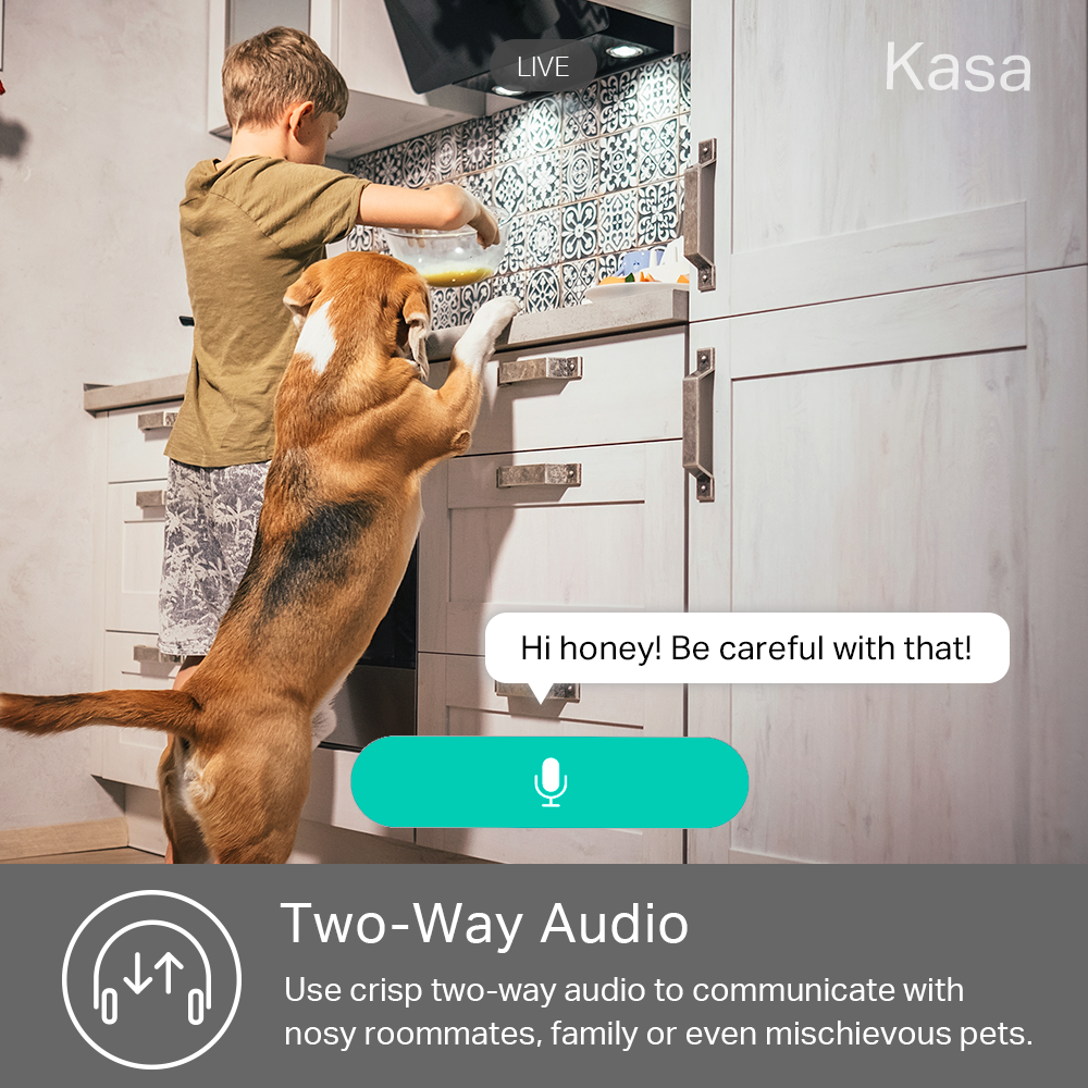 a child and dog in a kitchen with the caption, honey, be careful with that, demonstrating the two way audio feature