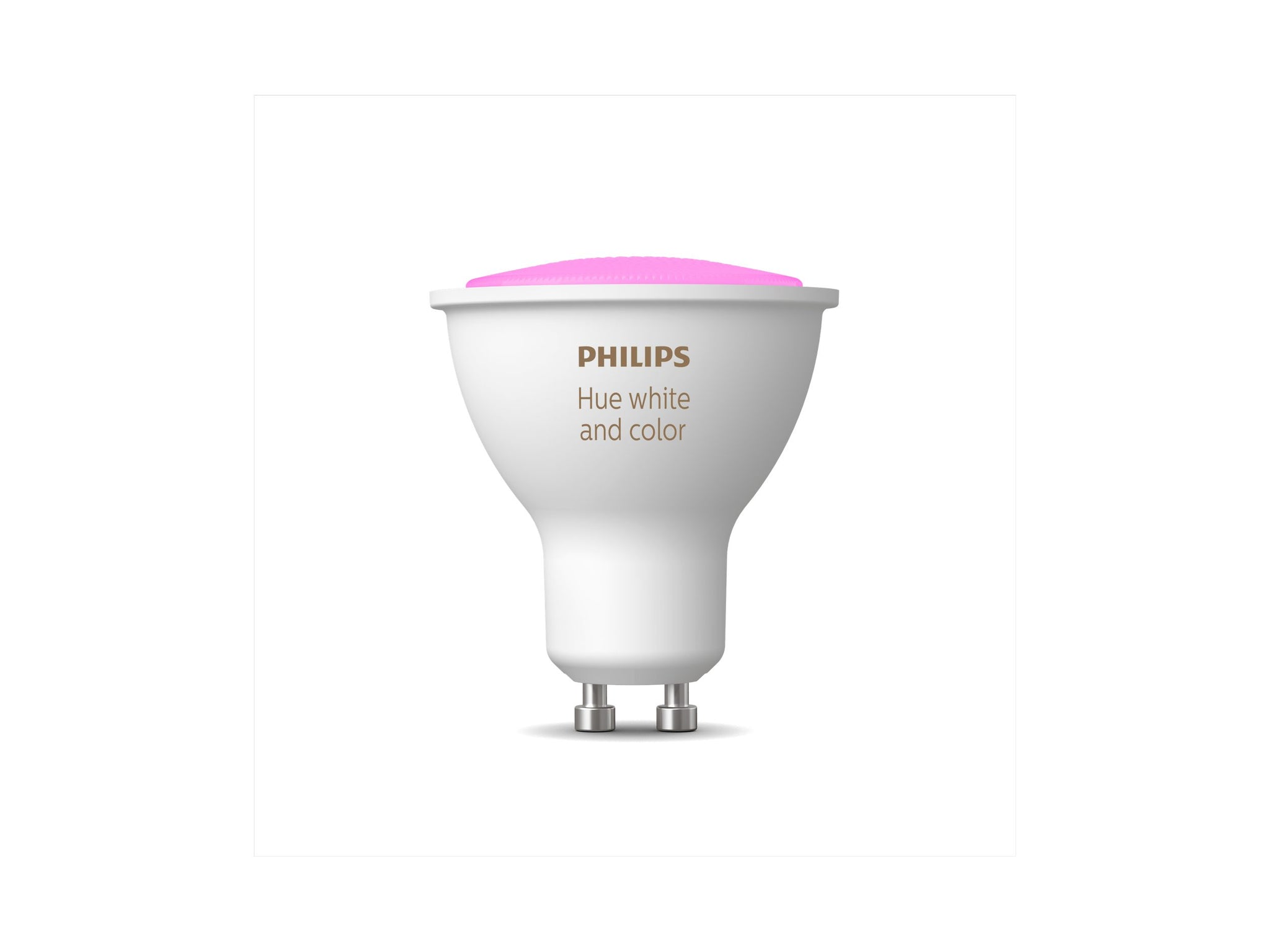 A Philips Hue spotlight bulb emitting a pink light