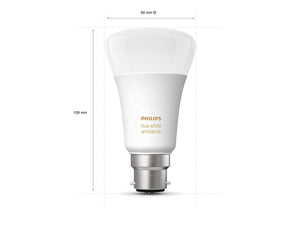 A philips hue white light smart light bulb with a B22 fitting alongside the measurements for height and width