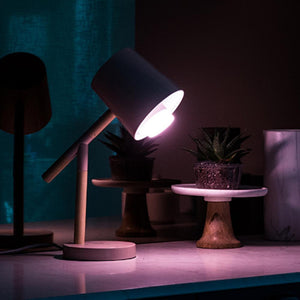 a desk lamp shining a bright white light