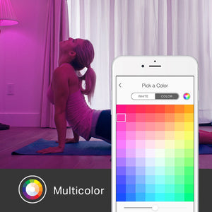 a person doing yoga and a mobile phone showing a colour chart for the lights