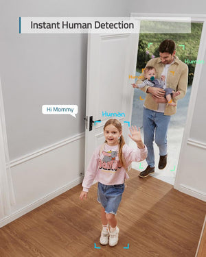 a child and man holding a baby walk through a door from the view of the camera.  caption reads, instant human detection