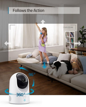 a child dancing on a sofa with a dog and the eufy pan and tilt camera in the foreground.  the caption reads, follows the action