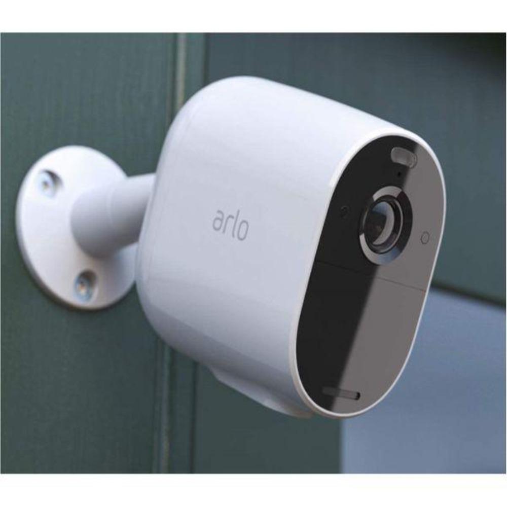 A wall mounted Arlo Essential Spotlight Camera
