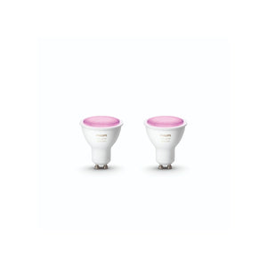 A pair of philips hue GU10 colour smart light bulbs.  Shown with a pink light effect